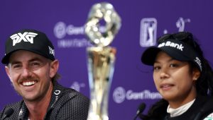 NAPLES, FLORIDA - DECEMBER 15: Patty Tavatanakit of Thailand and Jake Knapp of the United States speak during a press conference after their win on the 18th green during the final round of the Grant Thornton Invitational 2024 at Tiburon Golf Club on December 15, 2024 in Naples, Florida. (Photo by Carmen Mandato/Getty Images)